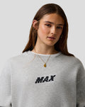 Female model in grey marl Max Verstappen sweatshirt with centered MAX logo on the chest