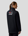 Back view of Haas Team Unisex Soft Shell Jacket with Haas and Toyota Gazoo Racing branding and a small flag.