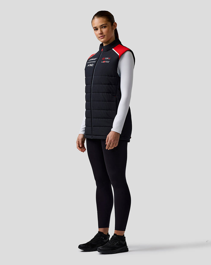 Model wearing Official Haas Team Unisex Gilet with red shoulder panels and full front zip.
