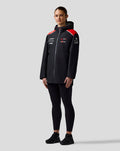 Model wearing Official Haas Team water resistant jacket with hood, full front zip and sponsor logos