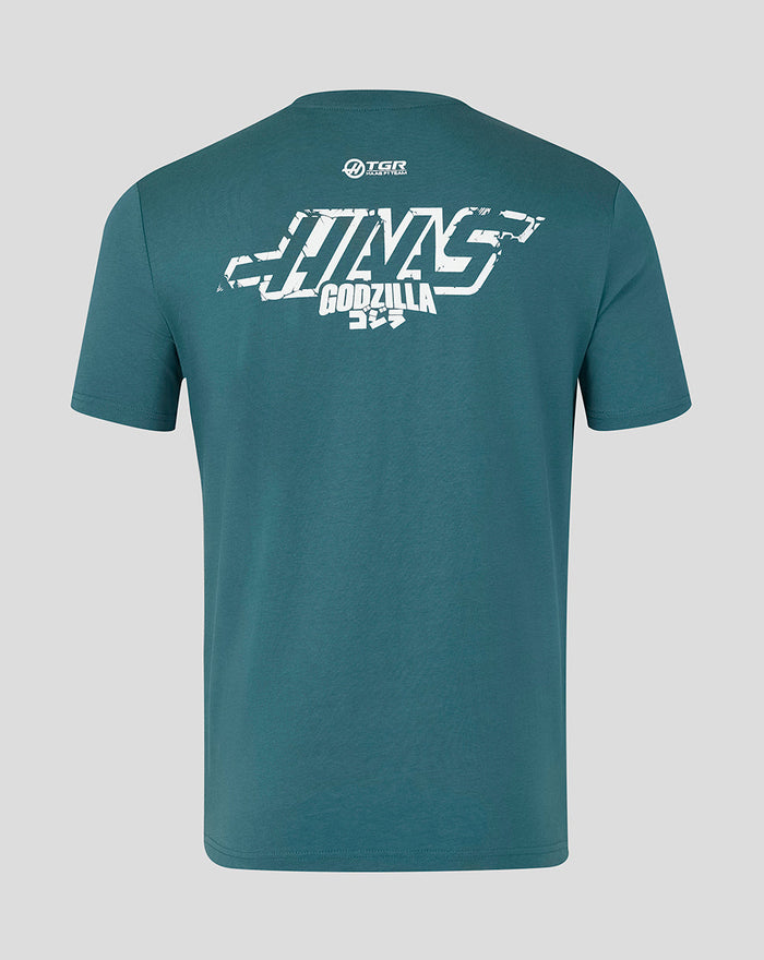 Back view of teal Godzilla x Haas Team T shirt with a large weathered Haas graphic across the back
