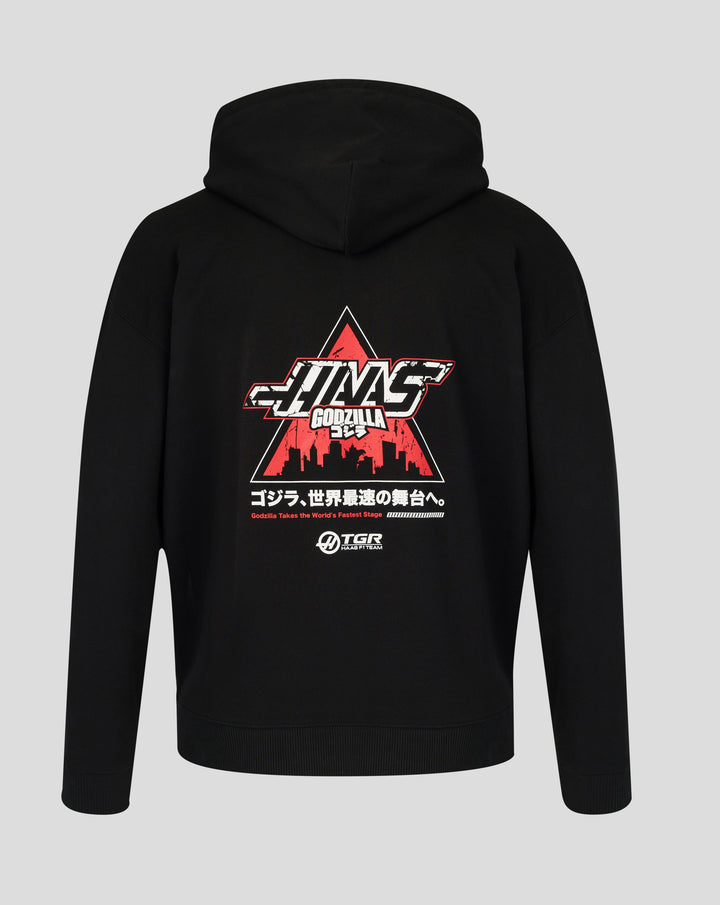 Back view of black Godzilla x Haas hoodie with a prominent red graphic featuring skyline and Japanese text