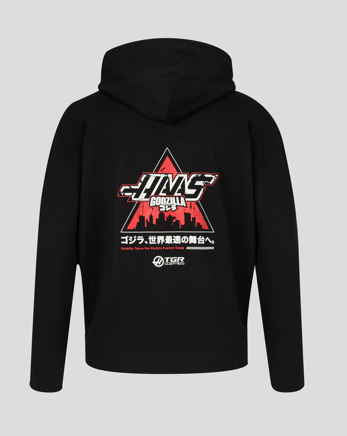 Back view of black Godzilla x Haas hoodie with a prominent red graphic featuring skyline and Japanese text