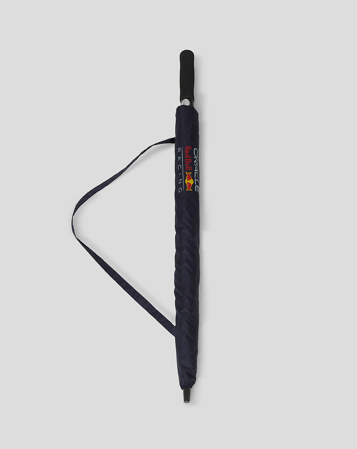 Folded navy Oracle Red Bull Racing umbrella with logo on strap