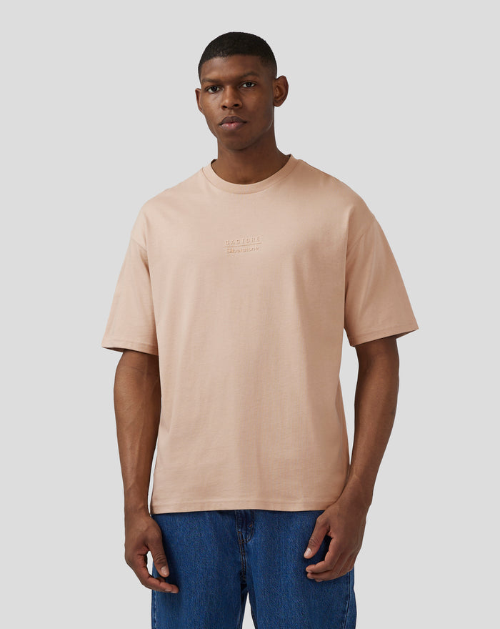 Model wearing Doeskin oversized short sleeve tee with tonal chest branding and back neck Silverstone logo