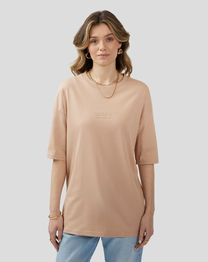 Doeskin short sleeve tee with embossed branding on chest shown on model