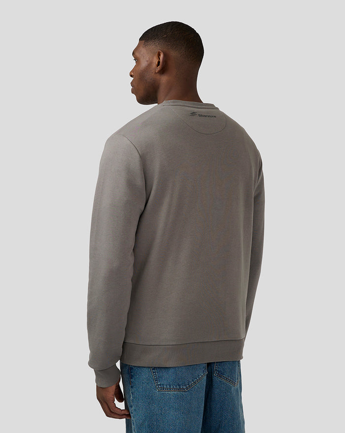 Back view of a man in a charcoal Silverstone Core Sweatshirt showing a small logo at the upper back