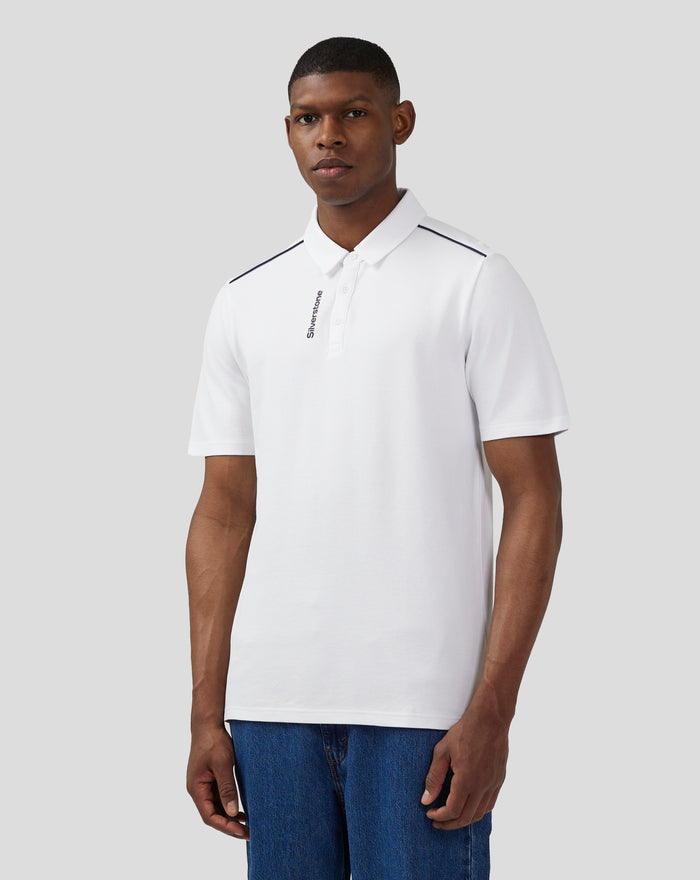 White polo shirt with navy shoulder piping and vertical Silverstone branding on the placket.