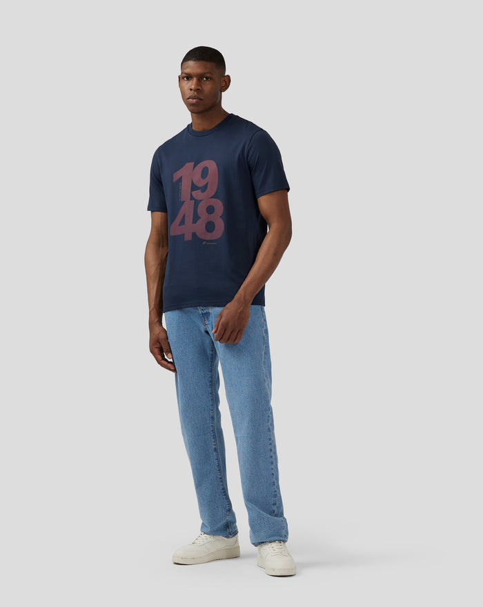 Male model wearing navy Unisex Silverstone Core 1948 T shirt with large burgundy front graphic