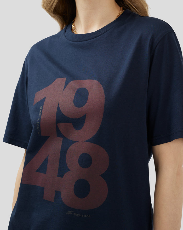 Portrait of a woman wearing a Black Iris Silverstone Core 1948 T-Shirt with a bold two-tone front graphic