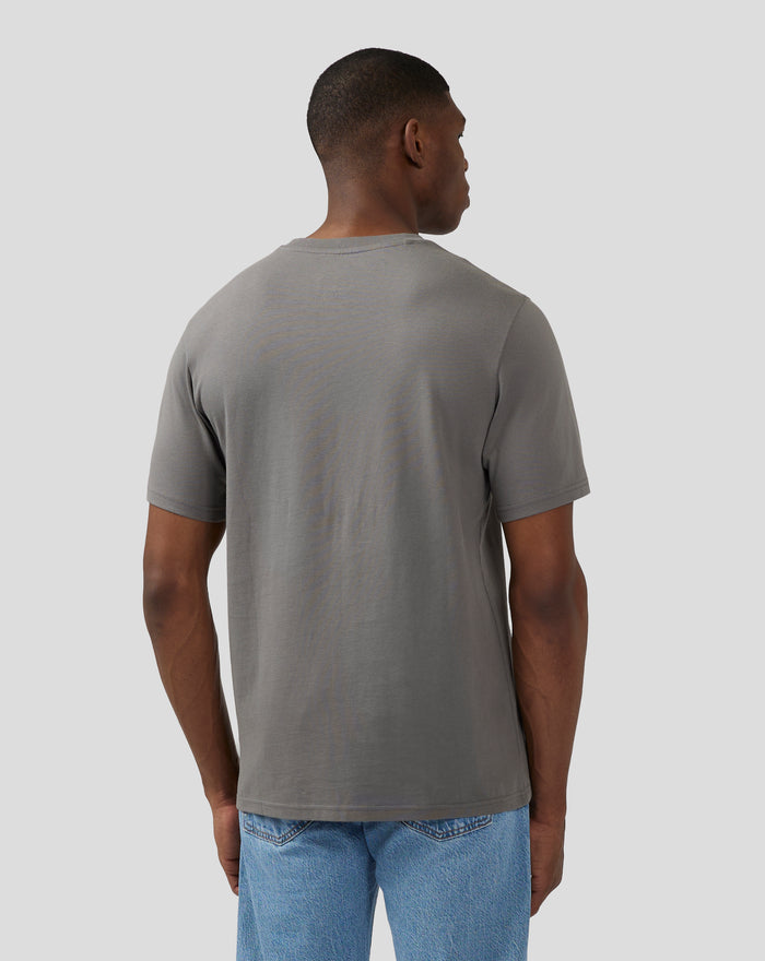 Back view of a model wearing the Unisex Silverstone Core 1948 T-Shirt in charcoal grey