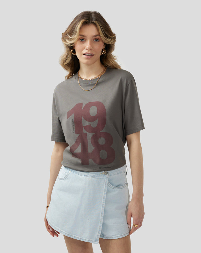 Female model wearing charcoal Silverstone Core 1948 T Shirt with a large two tone center front print