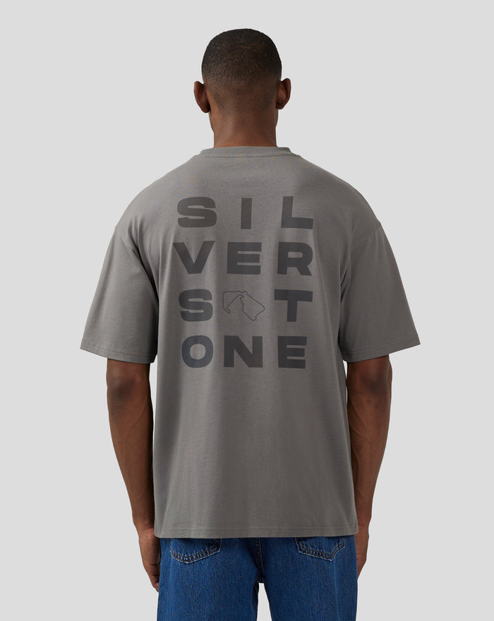 Back view of a charcoal grey oversized T-shirt with bold Silverstone lettering across the back.