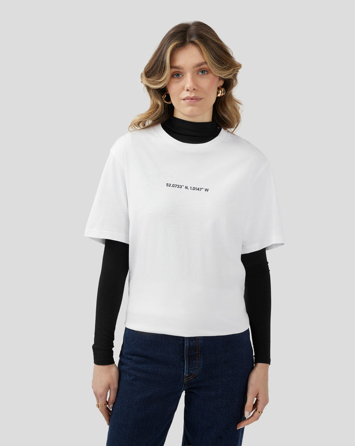 Back view of white unisex T shirt with large SILVERSTONE graphic across the back