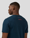 Back view of a male model in a navy Coordinate Graphic T-Shirt showing a red logo and Silverstone text on the upper back.