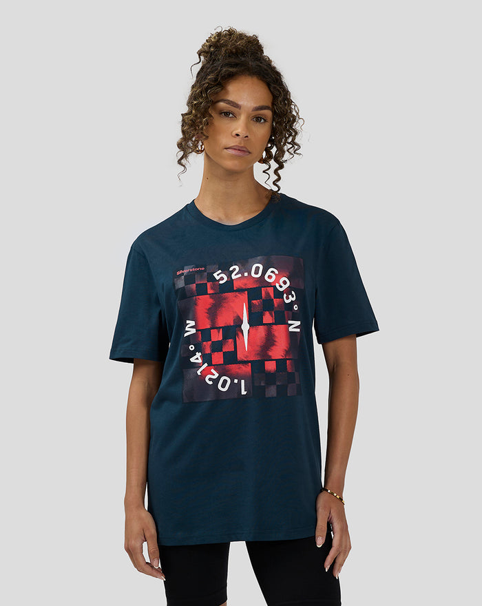 Female model wearing Unisex Silverstone x Castore Coordinate Graphic T-Shirt in Black Iris with a large red graphic on the front.