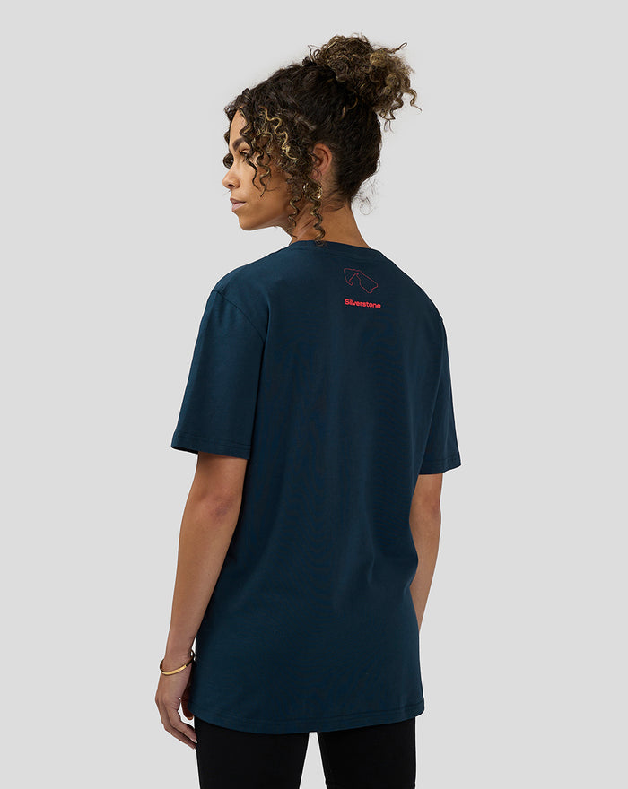 Back view of a model in a navy Coordinate Graphic T-Shirt with a small red emblem on the upper back.